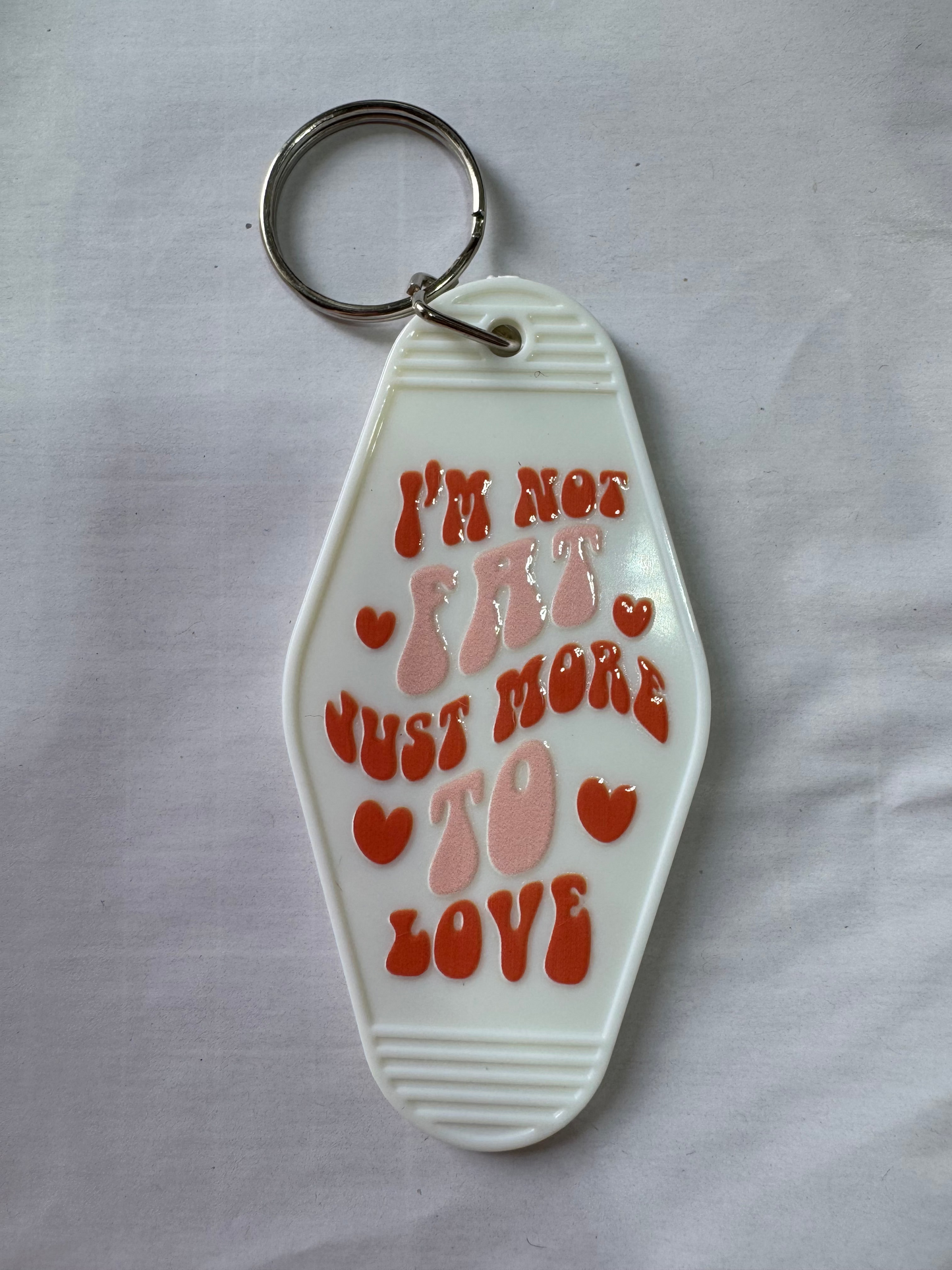 I'm not fat just more to love Motel Keyring