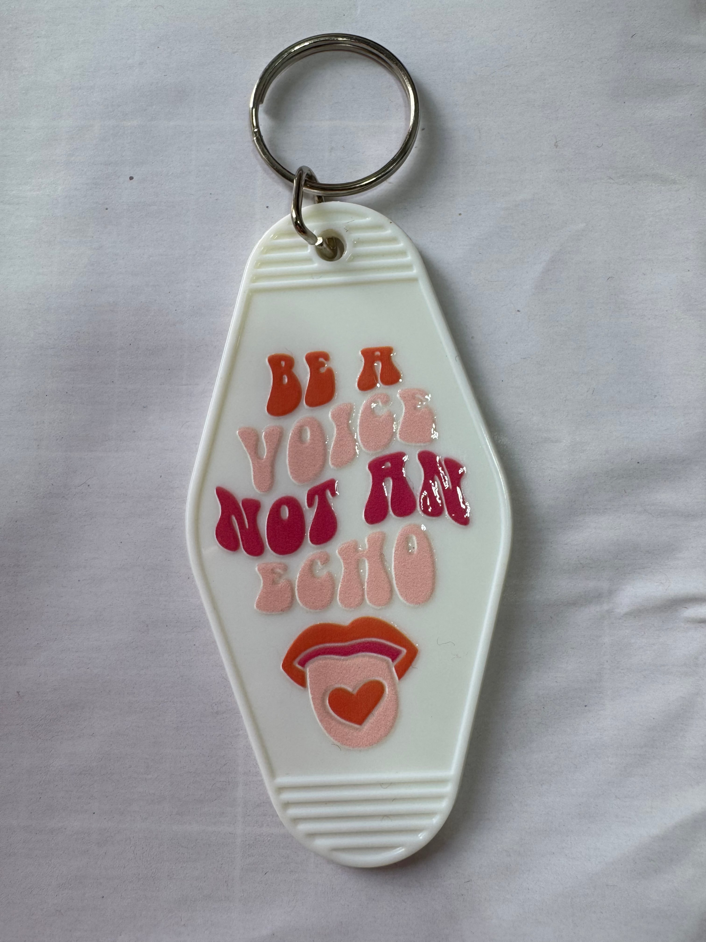 Be a voice not an echo Motel Keyring