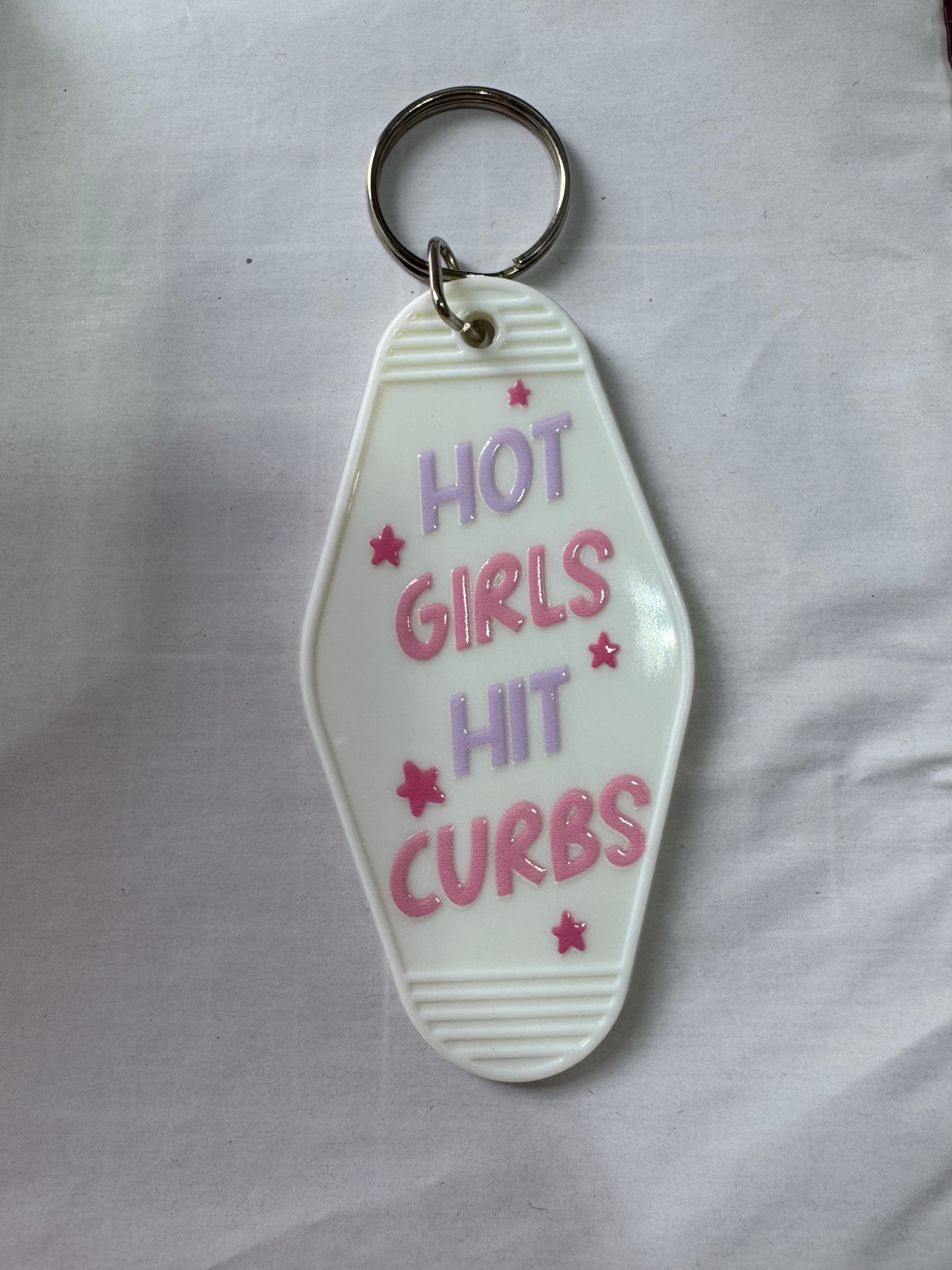 Hot girls hit curbs Motel Keyring